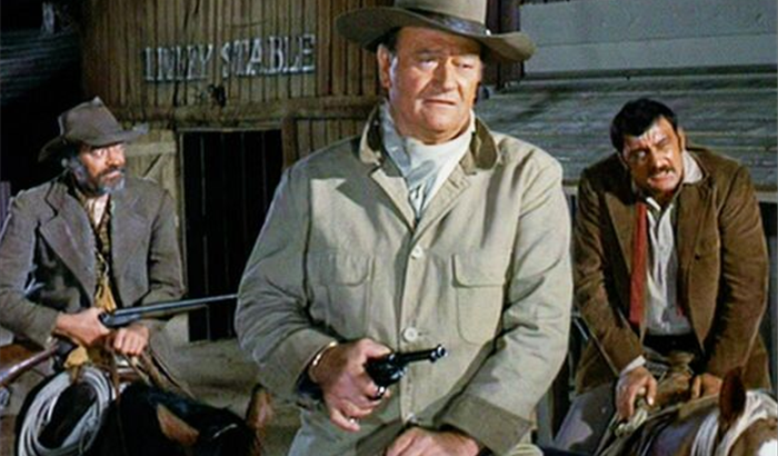 Despite A Torn Ligament And Three Broken Ribs, John Wayne Pushes Through The Pain, Determined Not To Let His Fans Down