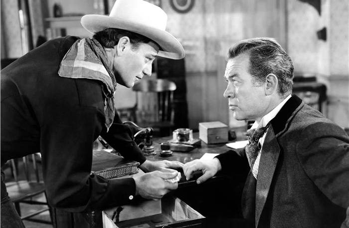 Scandal in Celluloid: John Wayne’s Battle with Columbia Pictures’ Chief and Forbidden Romance